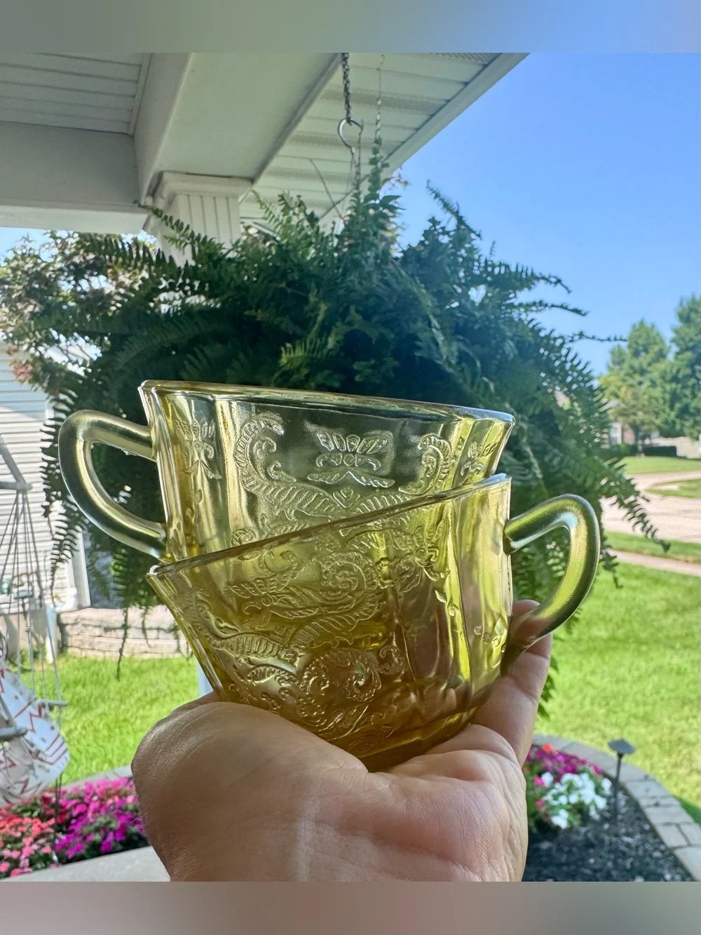 2 Vintage yellow depression glass tea cups.